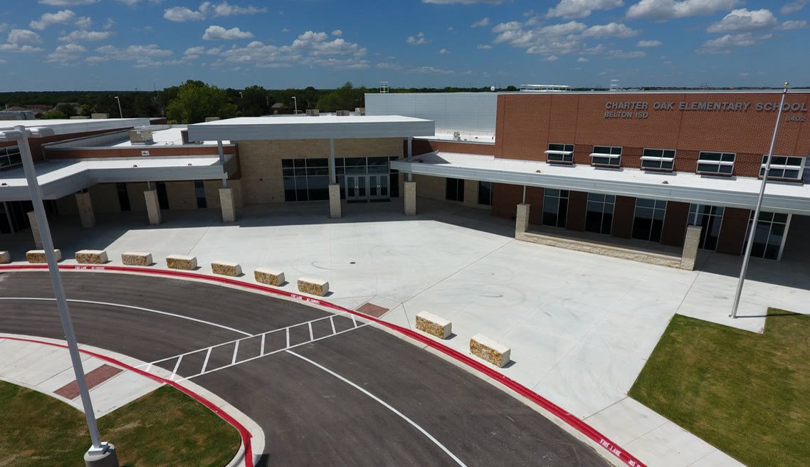 Charter Oak Elementary School exterior with a low-slope membrane roof, Belton ISD