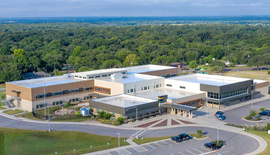 Aerial view of Thornton Elementary showing its low-slope membrane roof